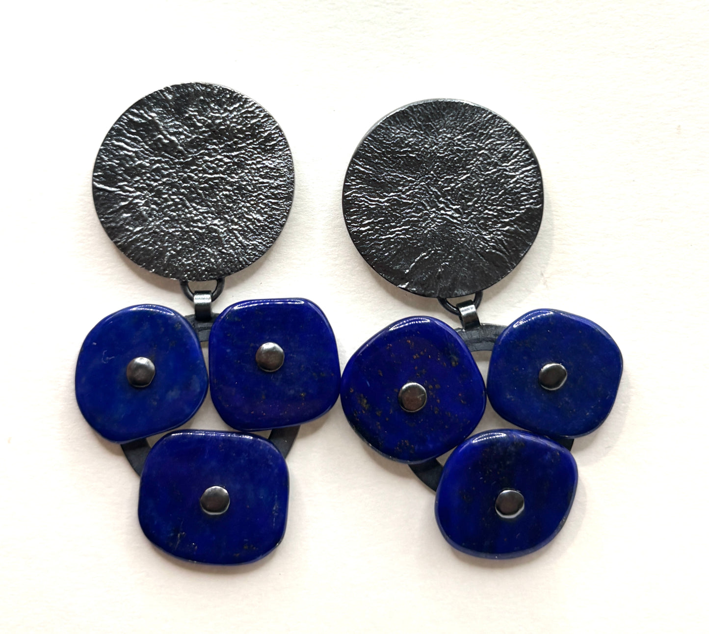 Roccia Earrings with Round Hollow Form Oxidized, Reticulated Silver Tops and Lapis Lazuli Riveted Disk Dangles