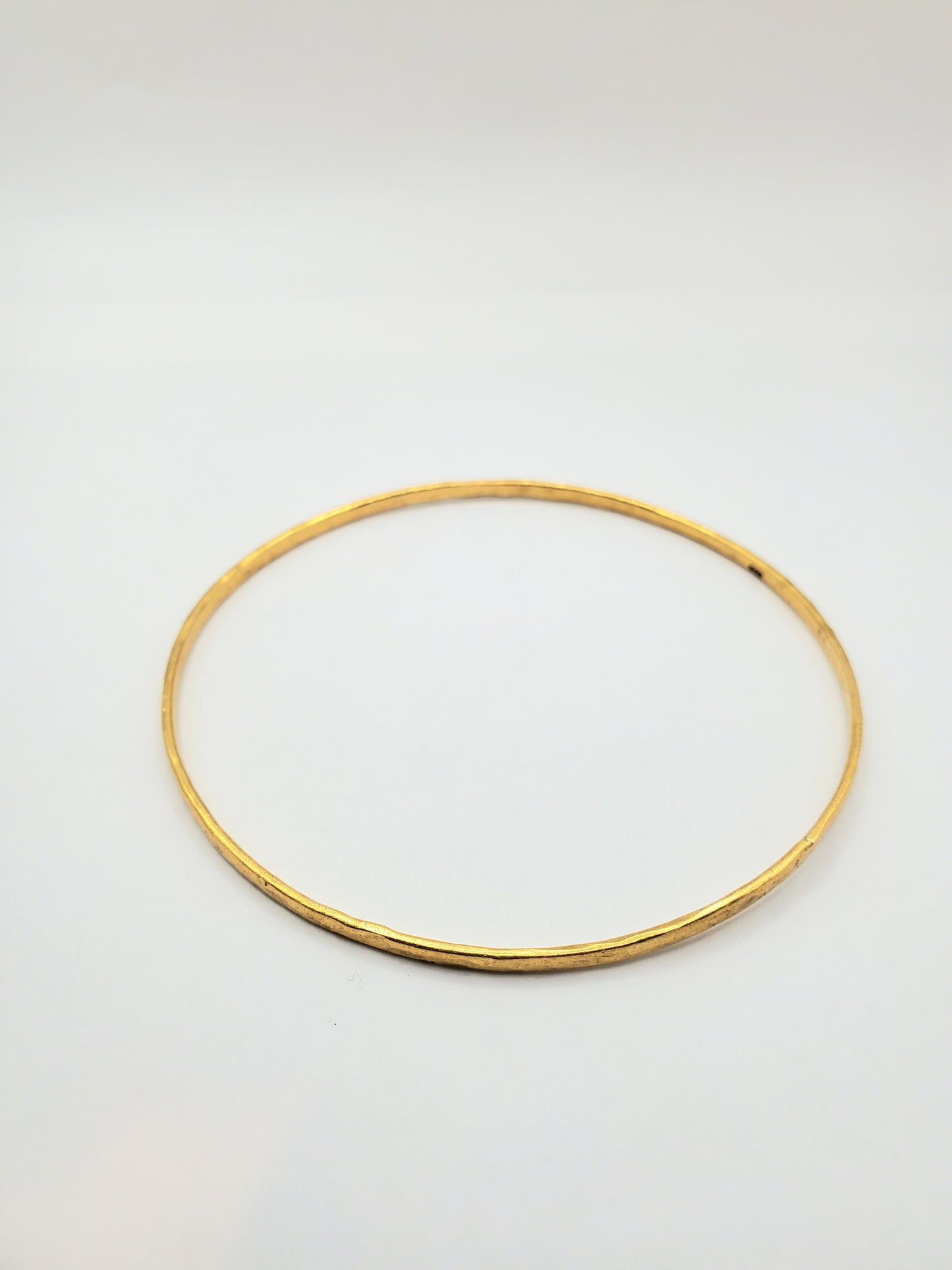 Thin Hammered Bangle in 22kt Gold
