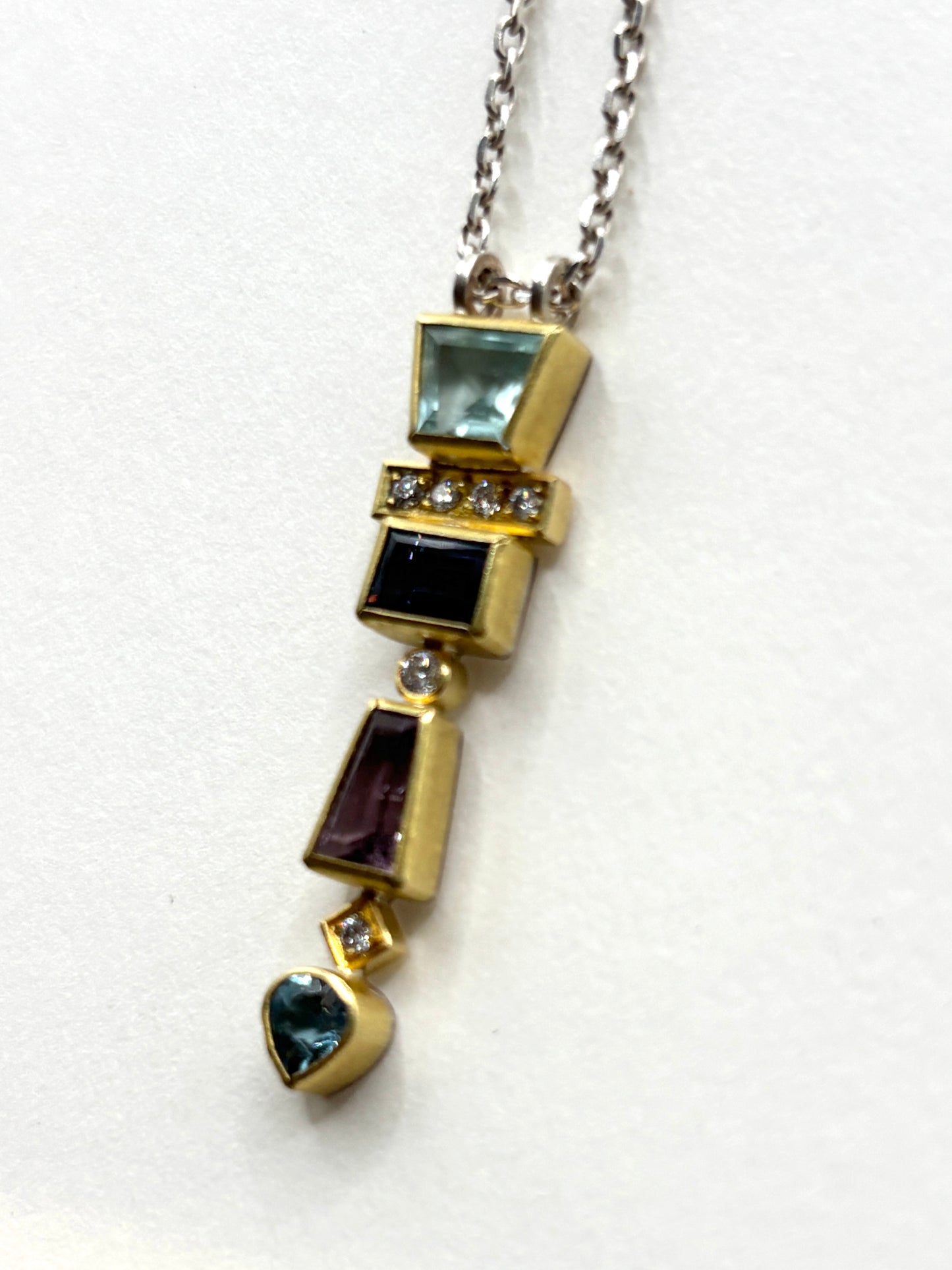 22Kt Gold and 18kt gold Totem  with Aqua, Spinel,a nd diamond