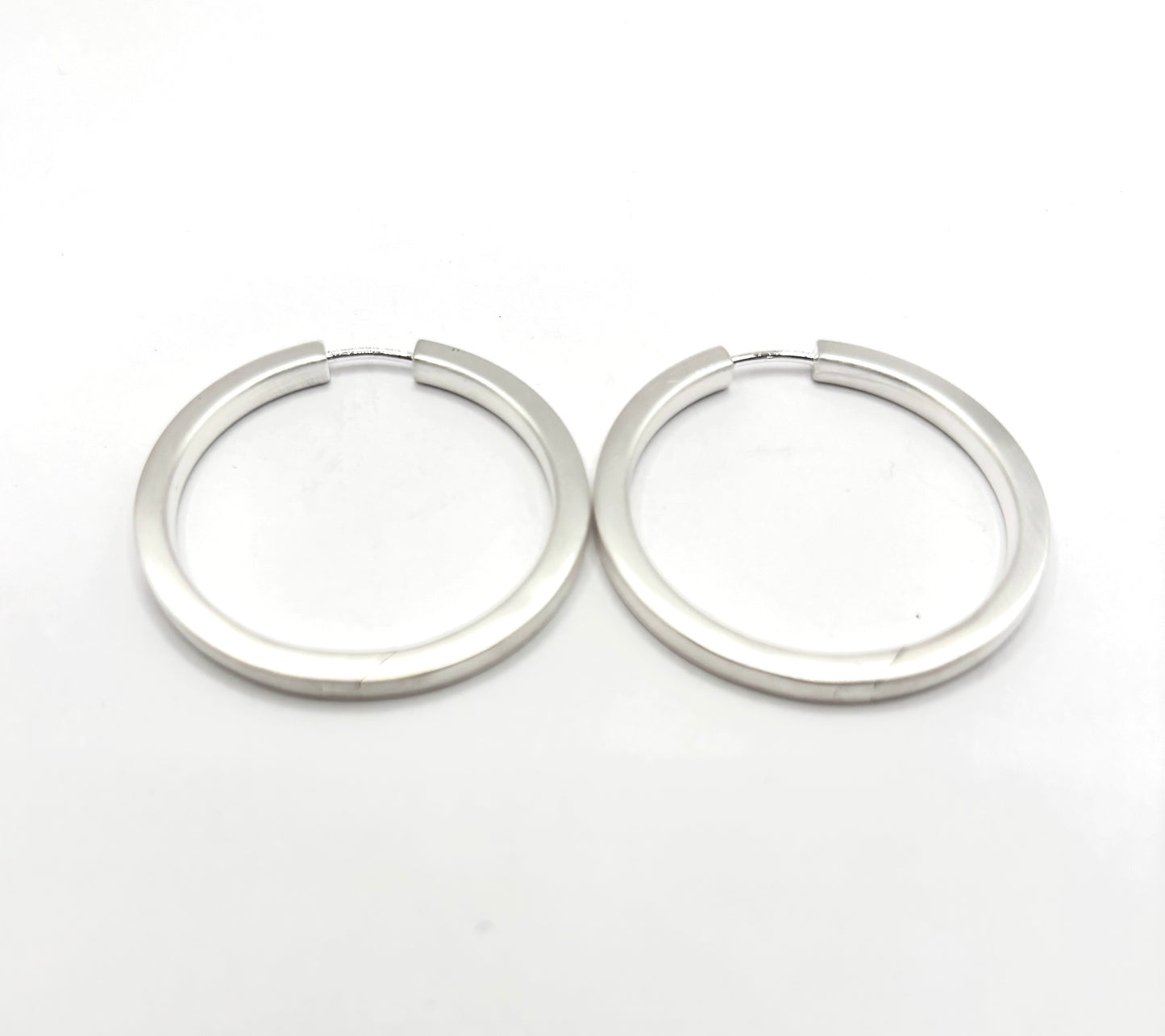 Sterling Silver hoops By Doris Leidt