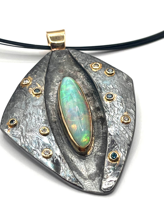 22k gold on oxidized sterling silver pendant with Ethiopian opal and blue and white diamonds