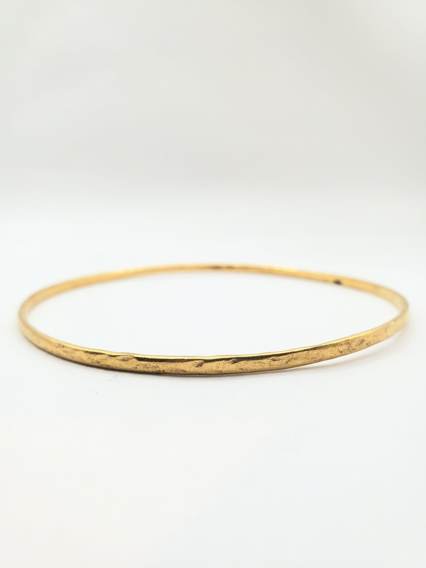 Thin Hammered Bangle in 22k Gold